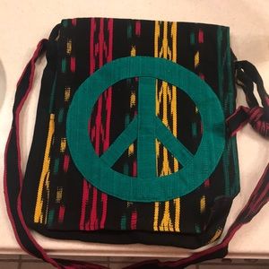 Black canvas peace sign bag